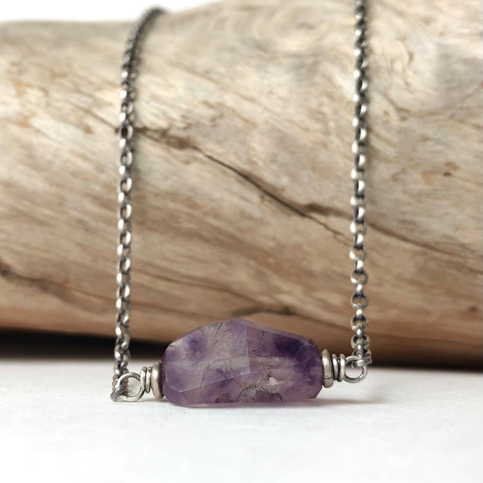 № 406 Rutilated Amethyst